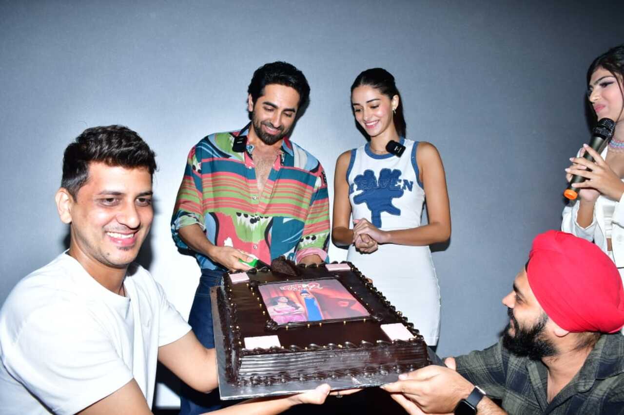 Ayushmann and Ananya cut a cake at the theatre